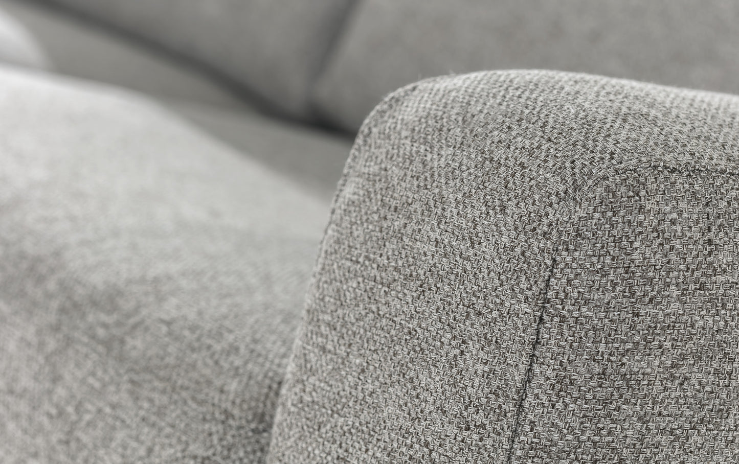 Accoudoir d'un canapé convertible Lisbona en tissu blend étain, revêtement tissée en gros plan