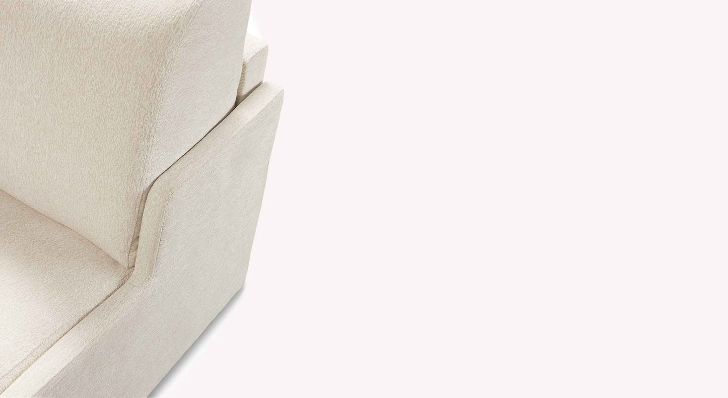 Canapé convertible JERRY Mini Misterio Ivoire en tissu ivoire doux offrant un design moderne et épuré avec un angle arrondi pour un confort optimal.