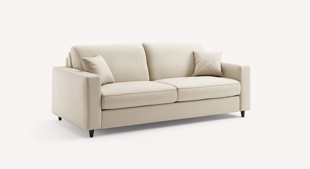 Canapé convertible Alba en tissu ivoire, design moderne avec accoudoirs carrés et deux coussins assortis