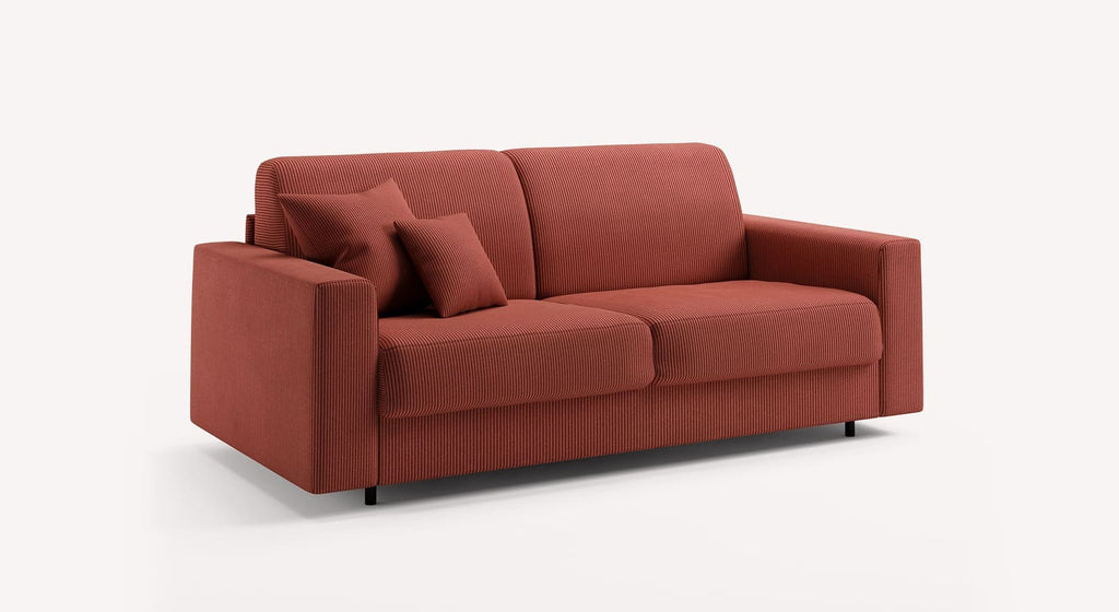 Canapé convertible Alix large en tissu côtelé rouge terra rossa avec deux coussins assortis