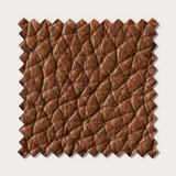 Échantillon de tissu marron texturé, aspect cuir luxueux