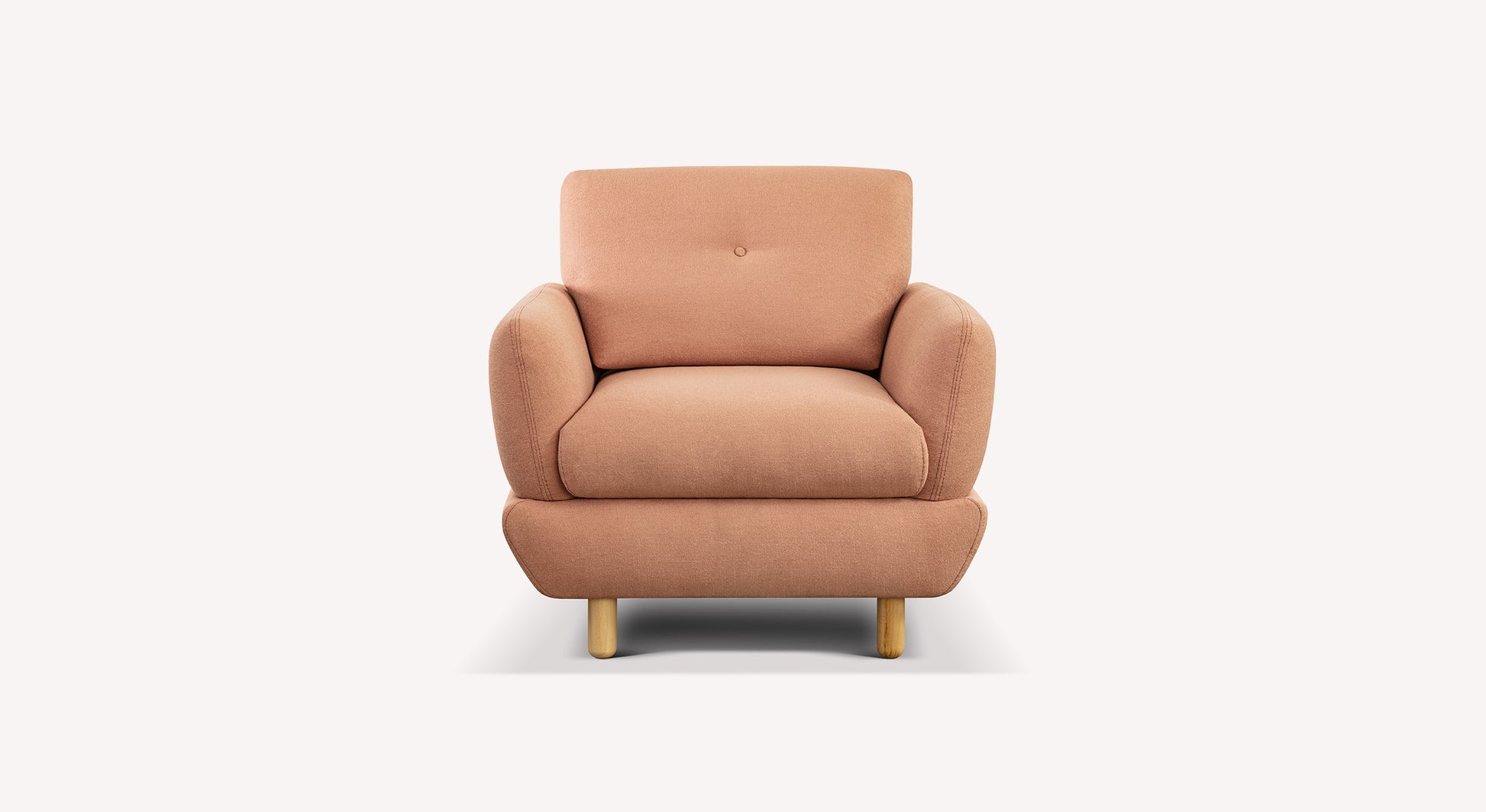 Fauteuil en tissu rose flamingo avec pieds en bois, design moderne et accoudoirs arrondis