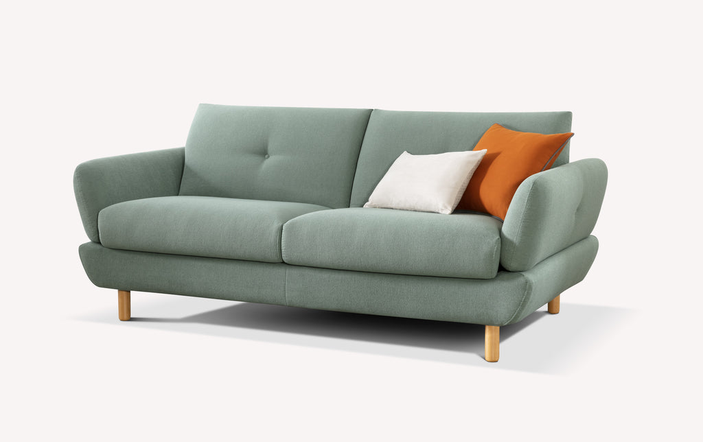 Canapé convertible en tissu eucalyptus avec coussins orange et blanc, modèle Finn