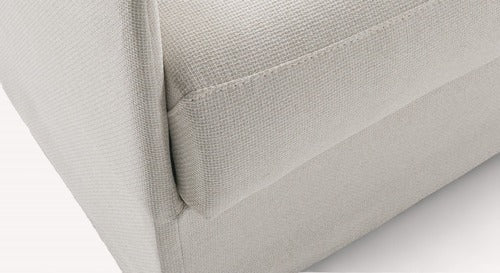 Détail d'un canapé convertible en tissu ivoire, modèle Lia, avec revêtement en relief