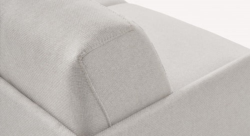 Canapé convertible en tissu ivoire, détail de l'accoudoir, modèle Lia Barrel