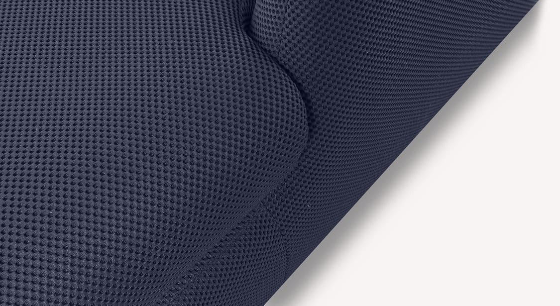 revêtement en gros plan d'un canapé convertible d'angle en tissu Vulcano marine, modèle Luz