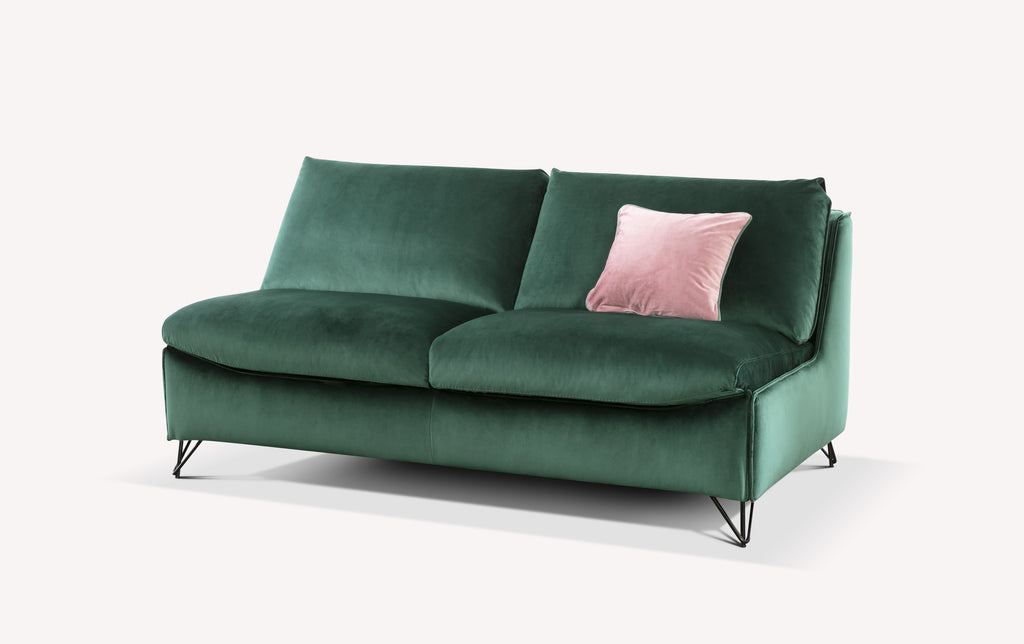 Canapé convertible en velours vert sapin avec coussin rose, modèle Miles Amsterdam, pieds en métal noir