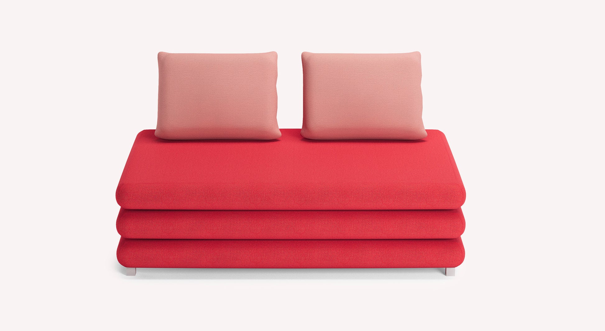 Canapé fixe rouge avec coussins roses, design suisse moderne